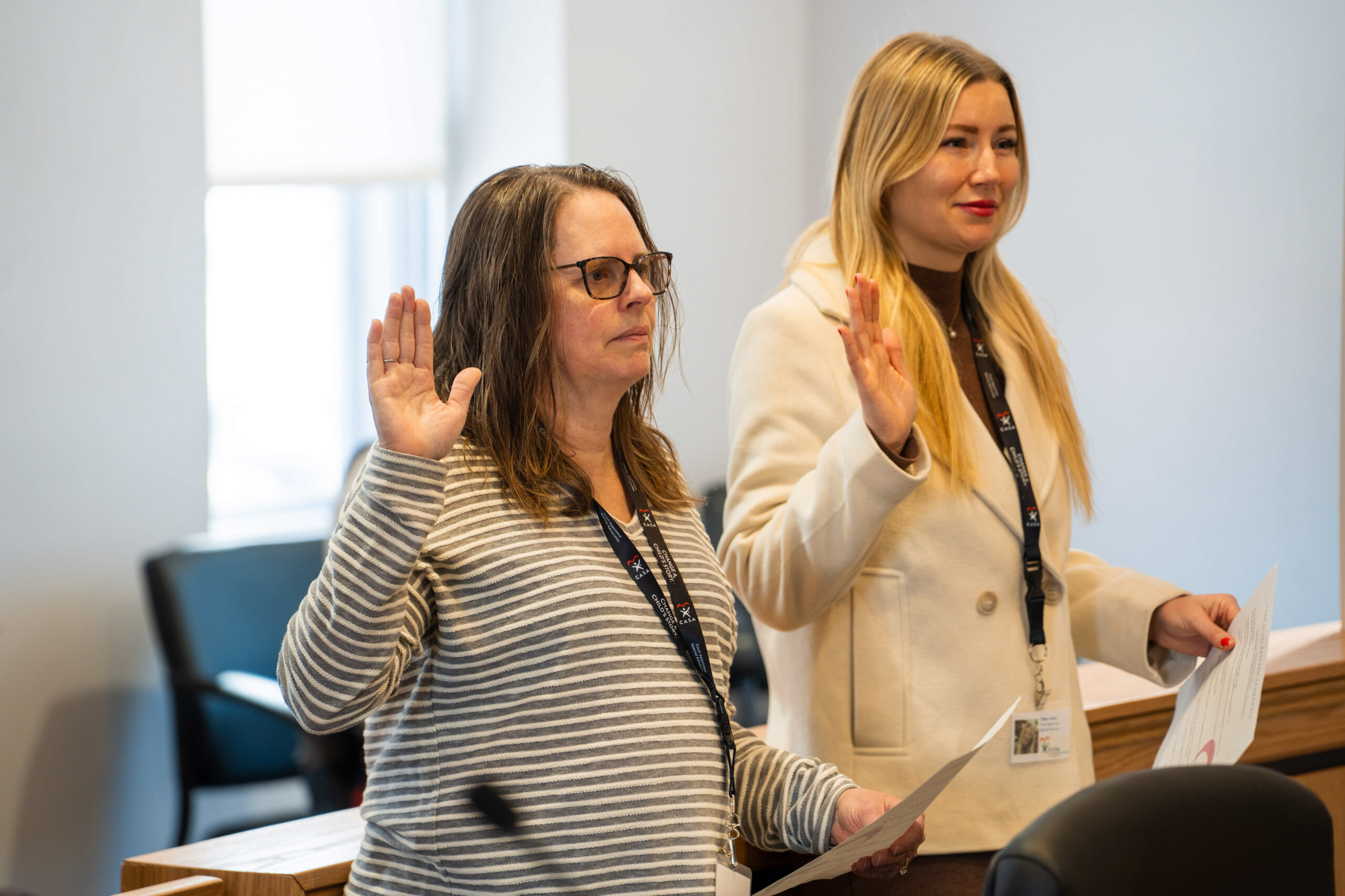 New CASA volunteers taking the oath