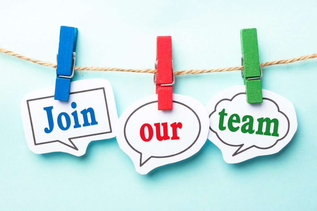 Three speech bubbles with motivational recruitment text ("Join our team") hang from a twine clothesline using colorful clothespins against a light blue background.