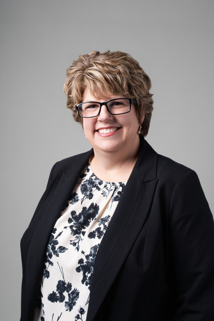 Beth McCoy, Executive Director